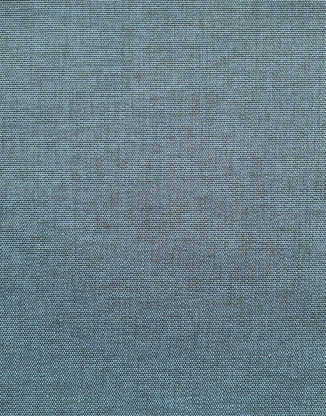 Blå stofoverflade produceret i Europa, ideel til design og håndværksprojekter.