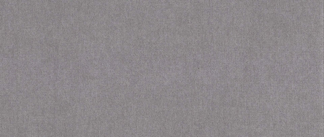 Textureret grå stof i neutralt design, produceret i Europa, ideelt til indretning og møbelprojekter.